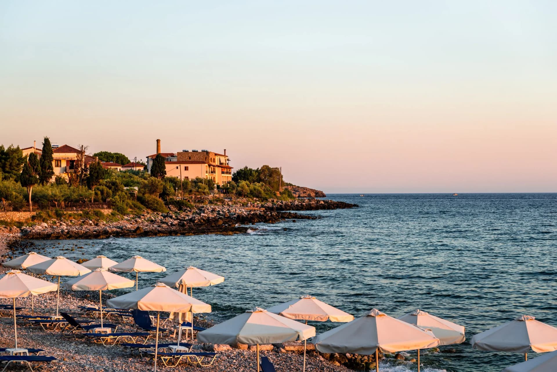 Afternoon view of the beach in village of Kardamili, in Messenian Mani, Peloponnese, Greece. July 2017.