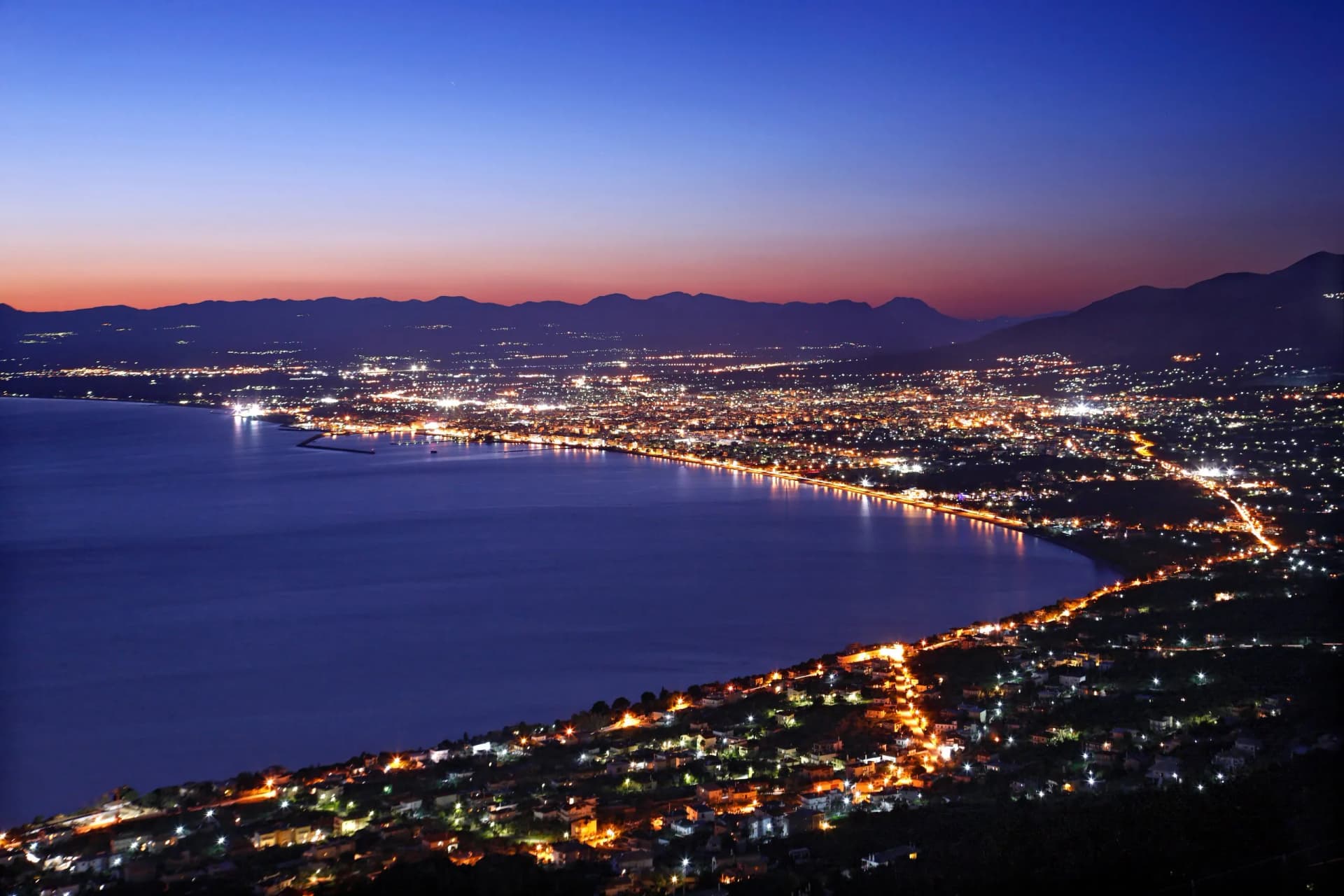 KALAMATA, GREECE. Panoramic night view of the capital of Messinia Prefecture, Peloponnese.