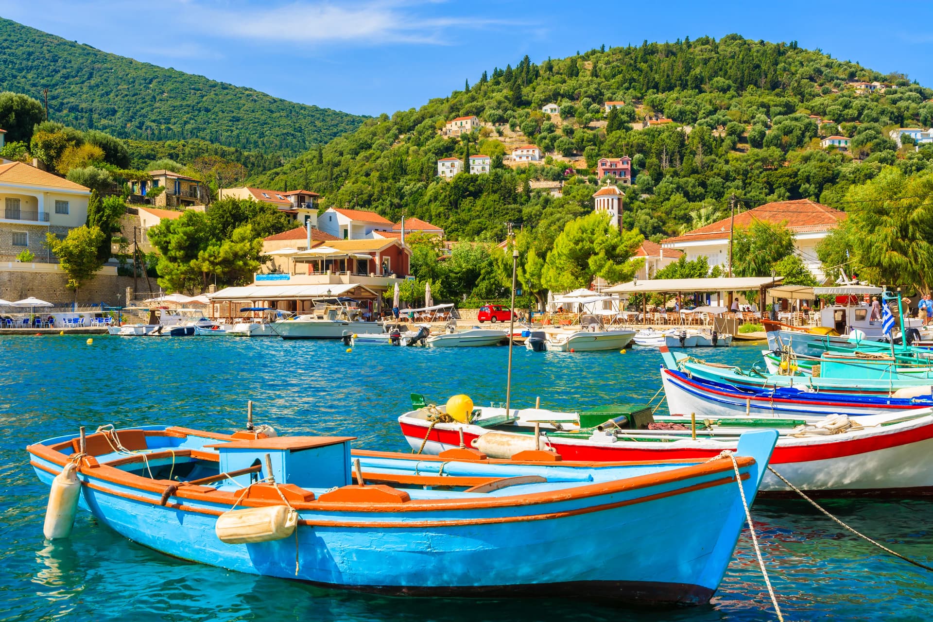 Colorful Greek fishing boats in port of Kioni on Ithaka island, Greece