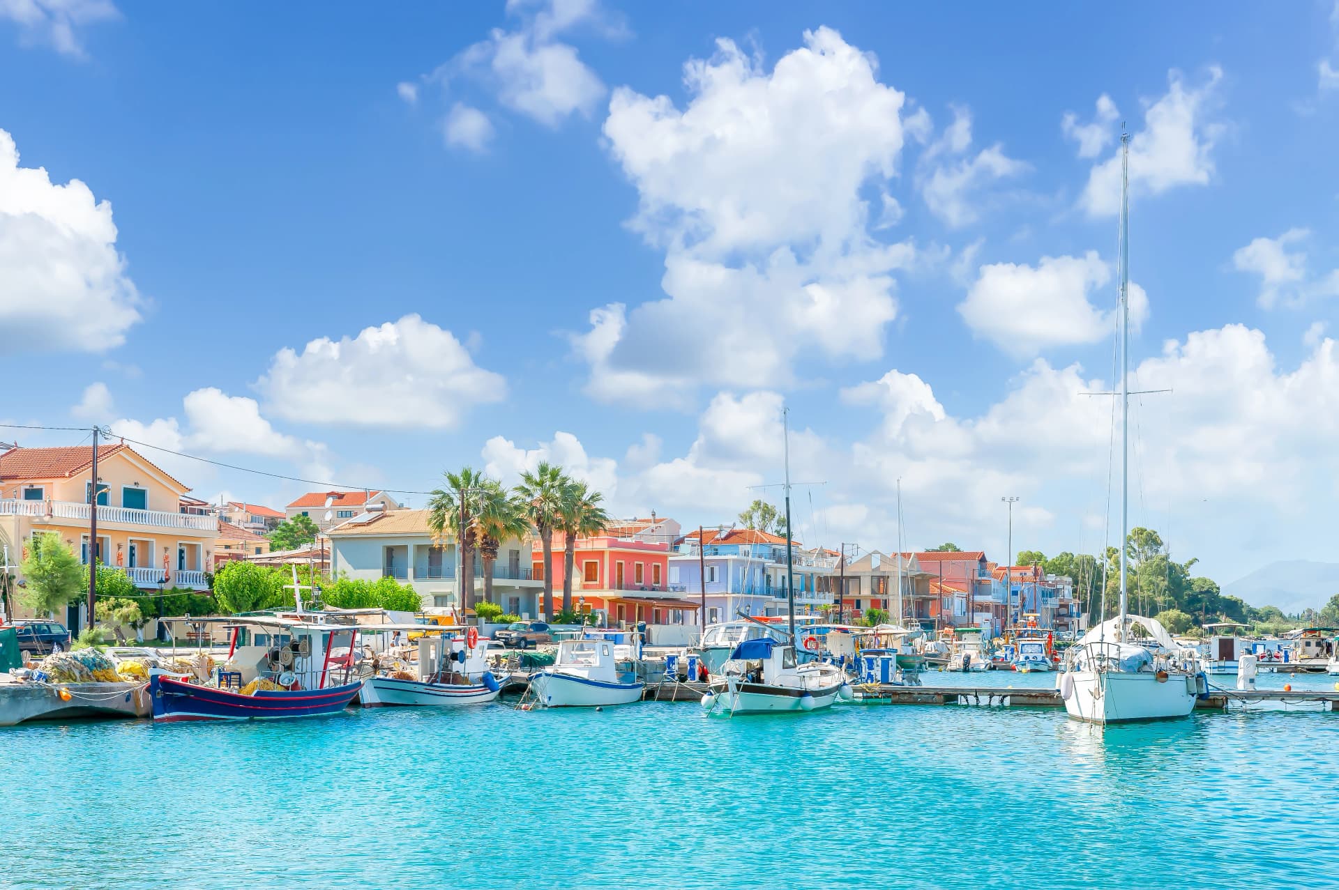 Landscape with fishing boats in port of Lixouri town, Kefalonia island, Greece